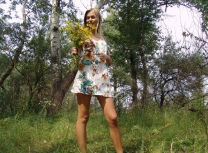 Sweet teen in short dress bending for sexy panty upskirt while picking flowers #1