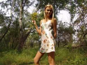 Sweet teen in short dress bending for sexy panty upskirt while picking flowers #8