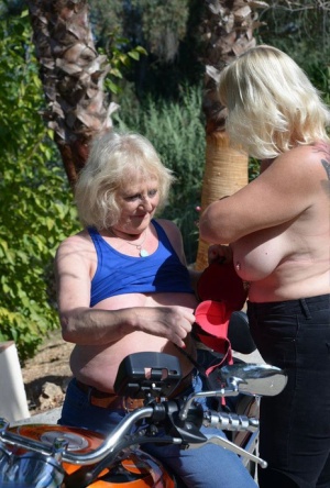Older blonde lesbians go topless outdoors on a motorcycle xxx pics #4