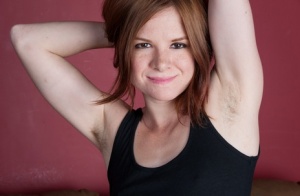Cute redhead Zia drops her jeans and stretches wide open to show a ginger muff #1