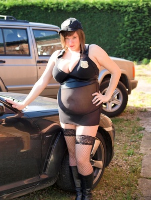 Overweight amateur Roxy exposes her goods on top of a Jeep in a yard Amateur hd photo #1