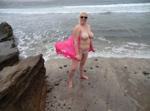 Older platinum blonde Barby exposes her plump body at the seaside #15