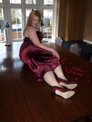 Blonde amateur Samantha gets naked in heels atop a dining room table #1